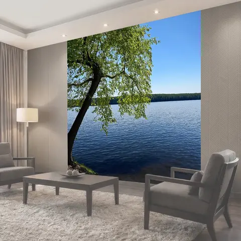 Фотообои Дерево, повисающее над озером, с отражением его листвы в спокойной воде