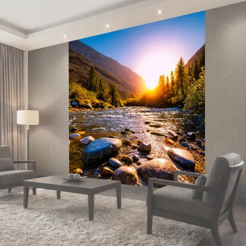 Фотообои Закат у горной реки, яркие камни сверкают на дне, великолепные кадры природы, завораживающая красота…
